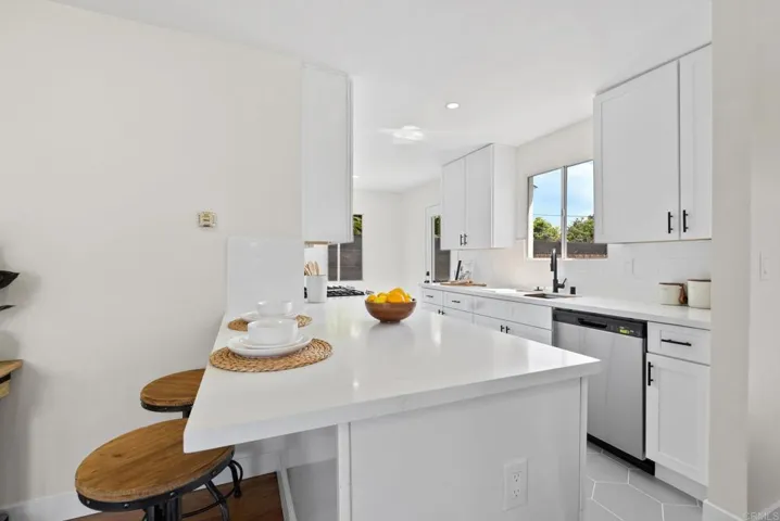 Quartz countertops, new cabinetry, new fixtures, sink, paint, lighting and more!