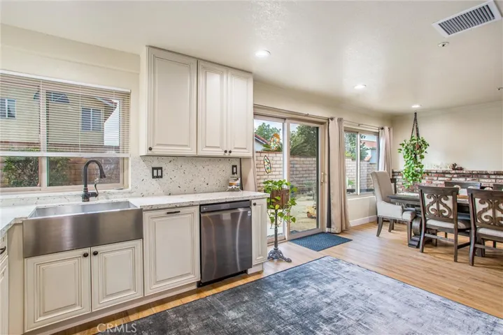 Upgraded kitchen with newer appliances, quartz counters, soft close cabinets and pull out drawers