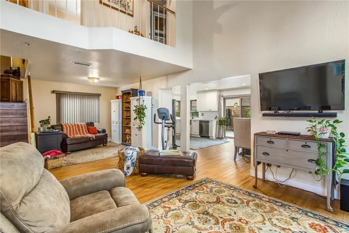 View from the Formal Living Room to the Formal Dining Room and Kitchen