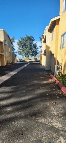 Driveway area to your own private 1 car garage.