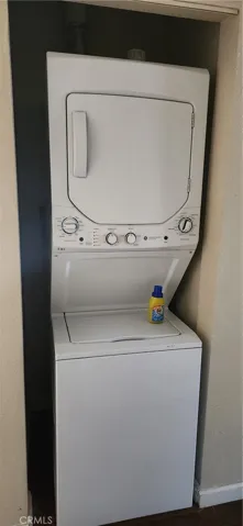 Comes with stackable washer and dryer in unit.