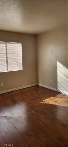 Rear 2nd bedroom has tons of natural light.