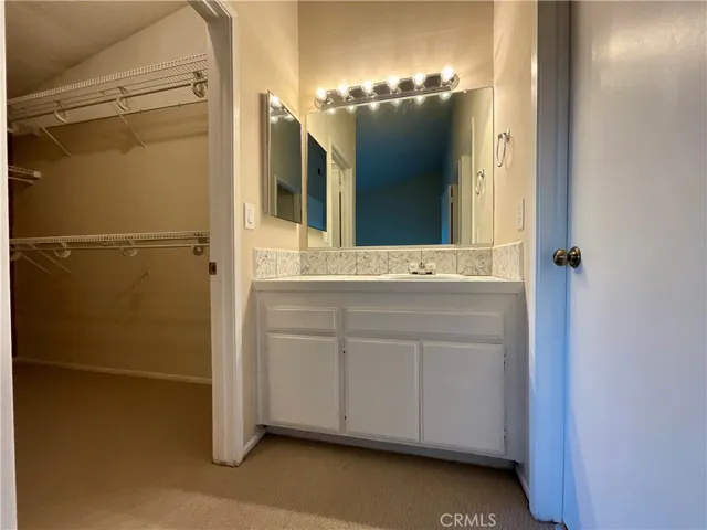 Master Bedroom Vanity between Walk-in Closet and Upstairs Bathroom