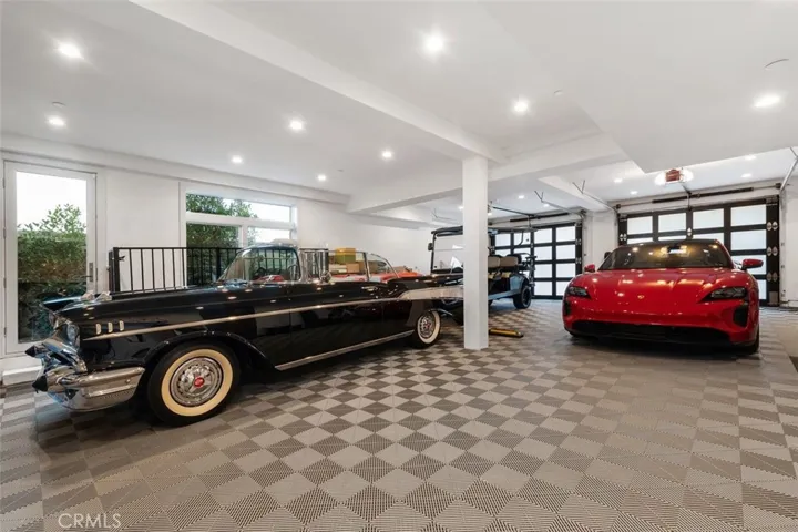 4 car plus oversized garage and plenty of storage.