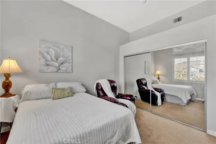 2nd Bedroom with mirror closet door