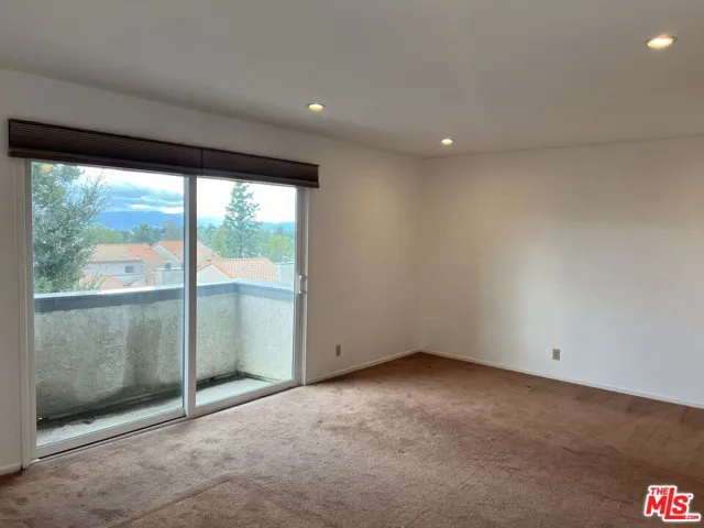 Primary Bedroom with​​‌​​​​‌​​‌‌​​‌​​​‌‌​​​‌​​‌‌​​‌‌​​‌‌​​​​ balcony