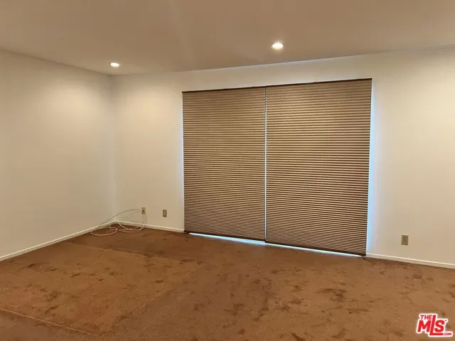 Primary Bedroom w blinds