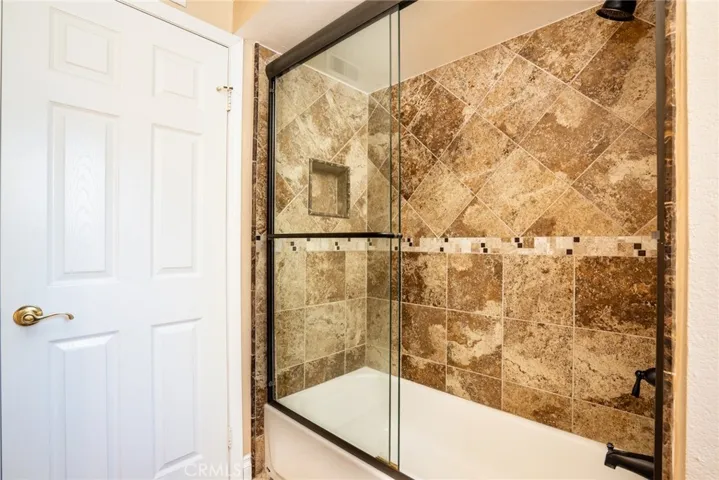 Upstairs hall full bathroom, shower with tub.