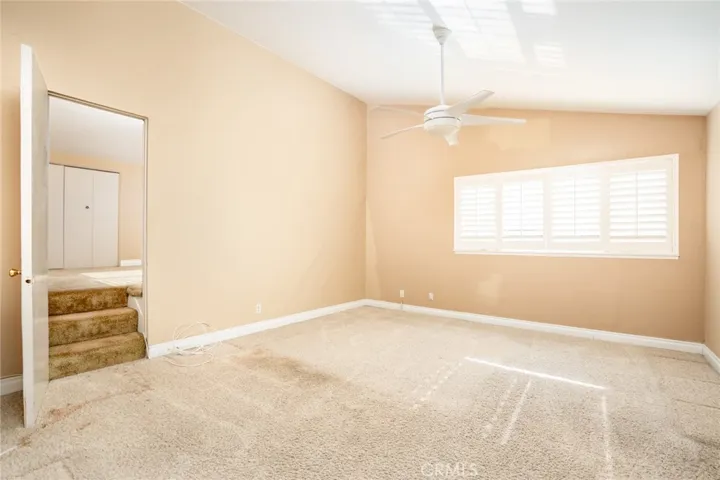 Primary  bedroom upstairs, has additional space in back for closet, storage, or office.