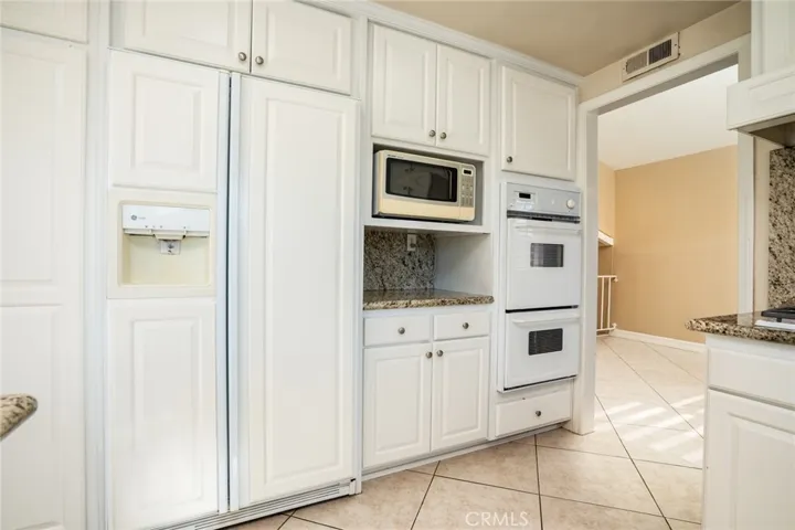Refrigerator and microwave included.