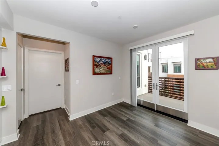 Patio doors in dining area lead out to spacious balcony