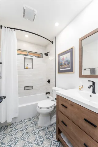 Bathroom #2 . Full bathroom with tub and shower.