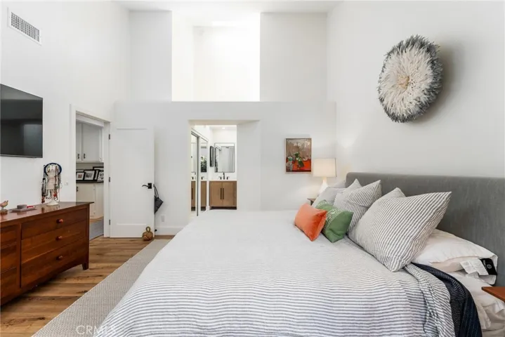 Another view of the primary bedroom, Located downstairs on the main level of the home.