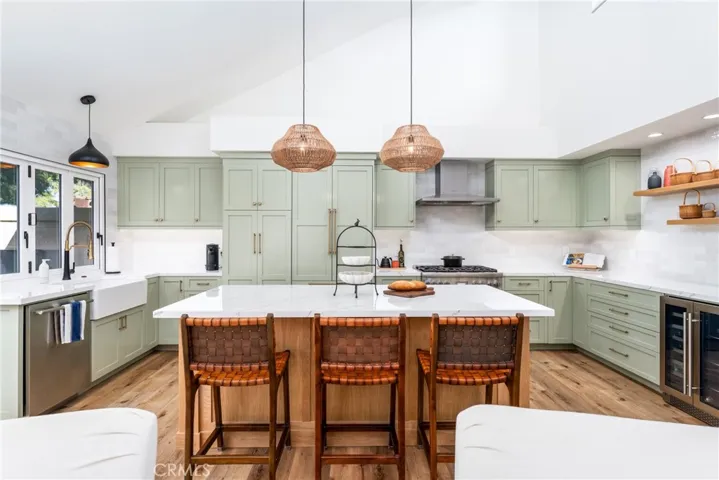 Pinterest worthy, custom kitchen with large island, designer finishes and high end appliances. This is what kitchen dreams are made of!
