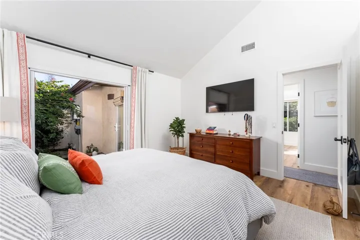 Another view of the primary bedroom