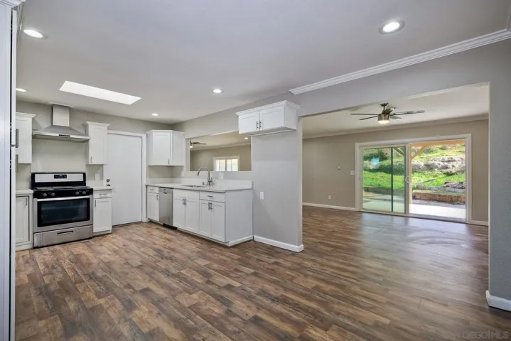 VIEW FROM KITCHEN TOWARDS OVERSIZED FAMILY ROOM