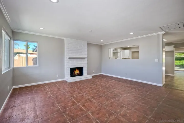 VIEW LOOKING FROM FRONT DOOR TOWARDS KITCHEN AREA