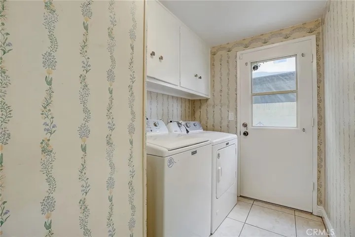 Laundry room with newer washer and dryer
