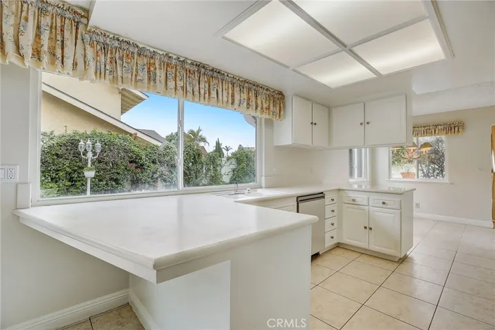 Sunny kitchen with many new appliances