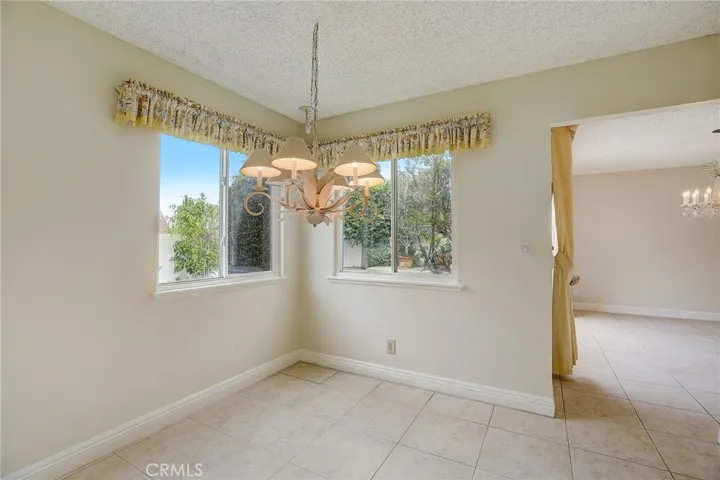 Kitchen eating area for sizeable table and chairs
