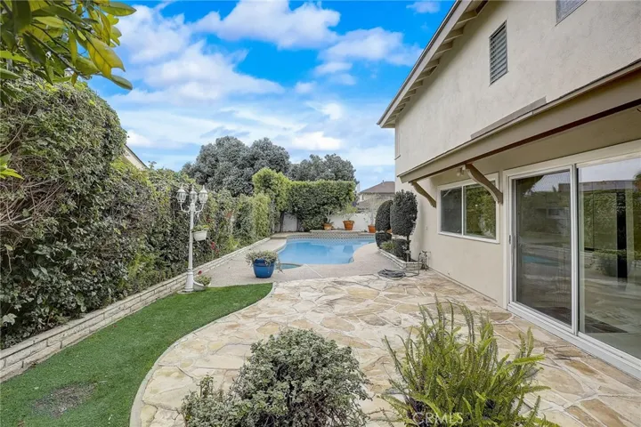 Inviting patio and pool with spa