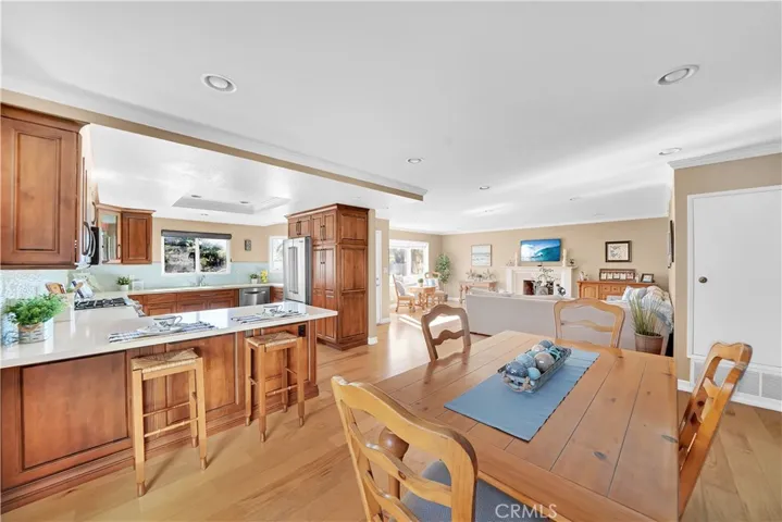 Another view of the Great-Room with Living, Dining, and Gourmet Kitchen