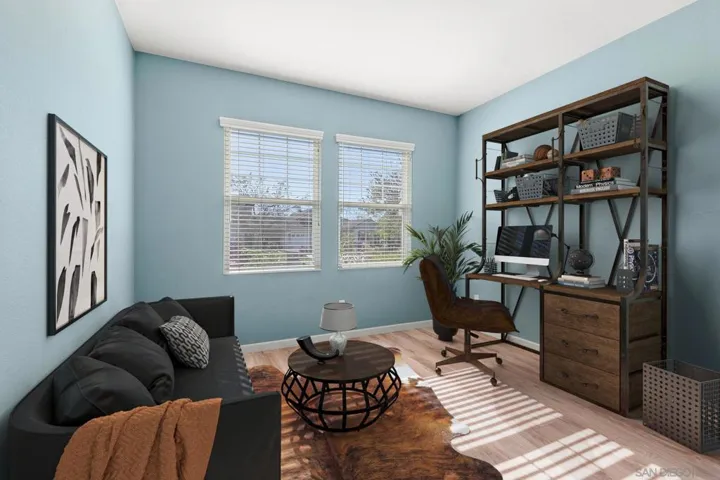 Bedroom at front of property. Show as an office  and guest space