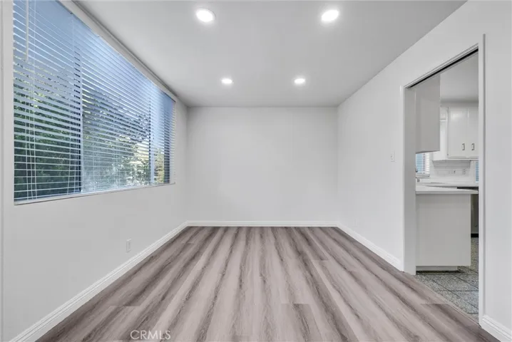 Northeast view of dining room and entrance to kitchen.