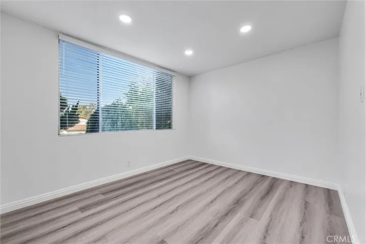 Northwest view of dining room next to kitchen.