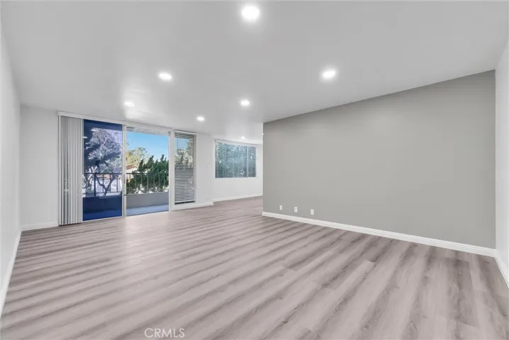 New recessed lighting, waterproof laminate flooring at living room