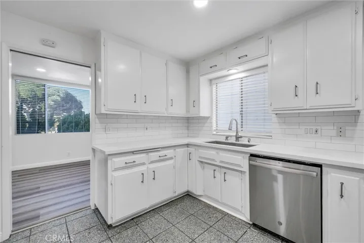Sout west view of kitchen and dining room toward bixby park