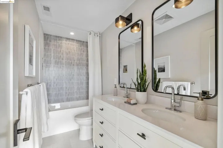Third bath with shower over tub