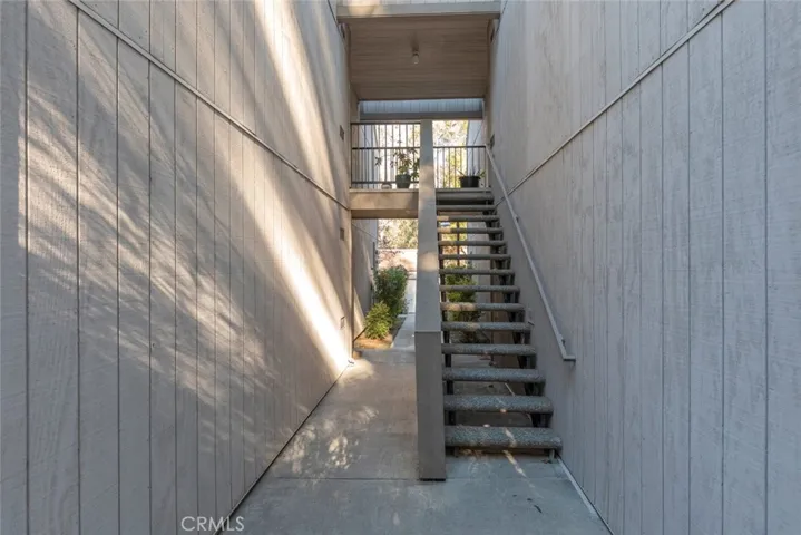 Condo staircase from downstairs view