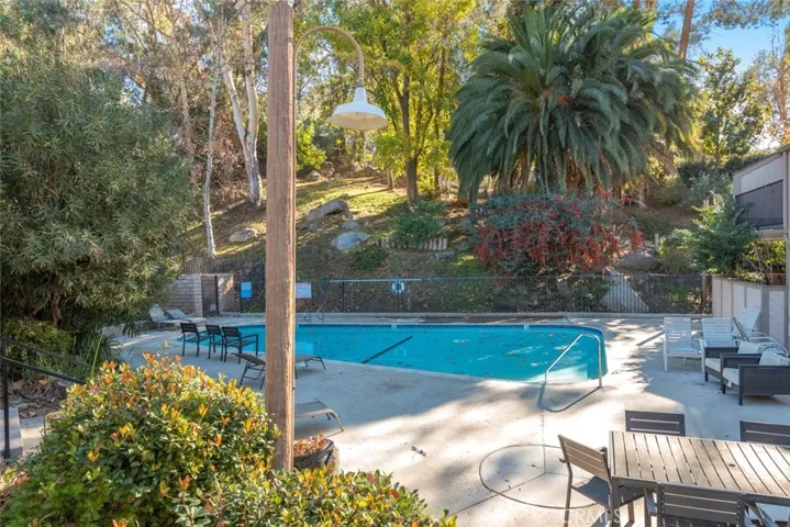 Inviting swimming pool area with comfortable seating