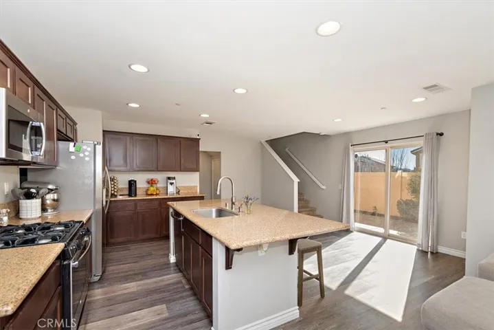 Nice island work space with granite counters