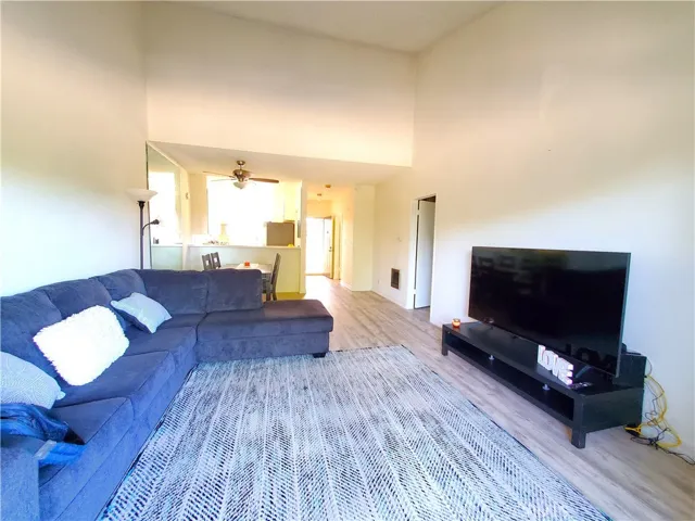 Open layout with vaulted ceiling