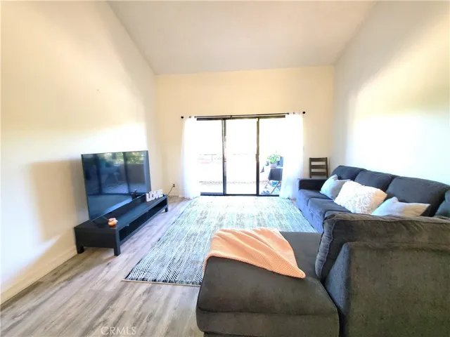 Living room with vaulted ceiling