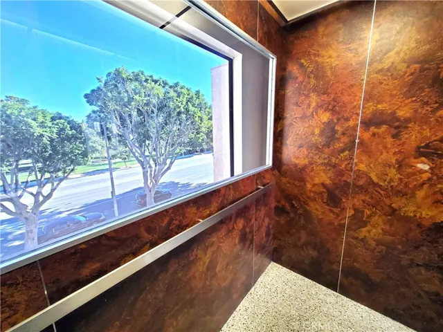 Large community elevator with view of the park