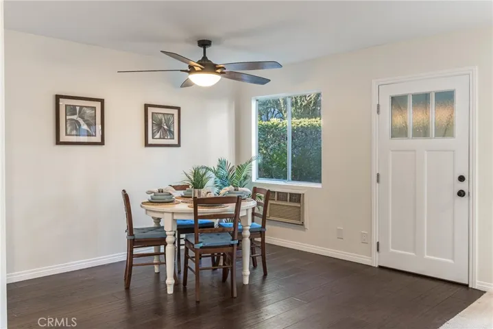 Dining room is spacious and bright and has pleny of room to be used for more than just dining.
