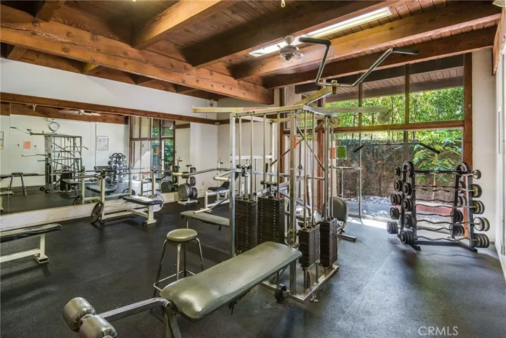 Fitness center with free weights, machines and more.....who needs to pay for a gym when you have this?