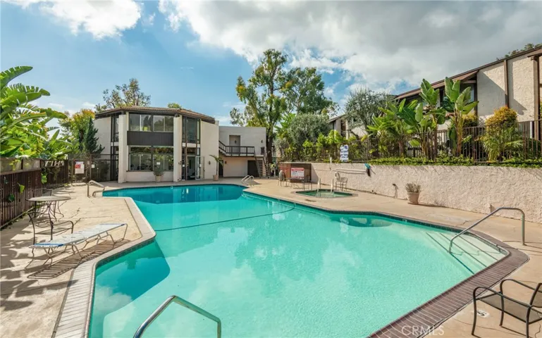 One of three pool areas.  This one is in the center of the community.  Fitness center overlooking the pool can be seen in the building at the end of the pool.
