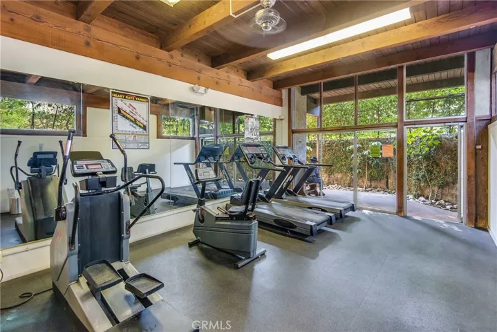 Fitness center with treadmills and biks, free weights, machines and more.....who needs to pay for a gym when you have this?