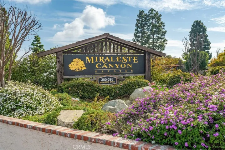 Miralese Canyon Estates is a guard gated community with park like atmosphere and great amenities including 3 pool and spa areas, multiple fitness rooms, clubhouse, pool and ping pong room and more