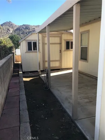 COVERED PATIO TOWARD SHED