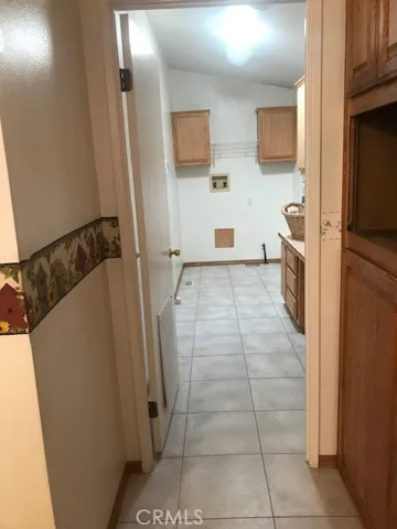 TOWARD LAUNDRY ROOM FROM KITCHEN