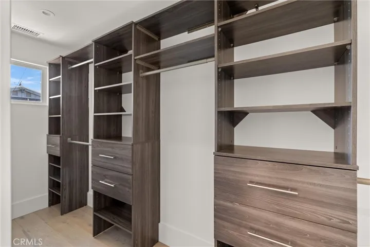 One of 2 walk-in closets