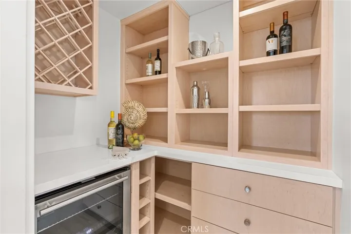 Walk-in pantry with refrigerator