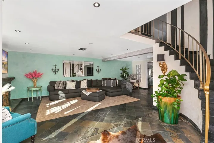 Welcome HOME. Please take note of the custom black recessed lighting everywhere.