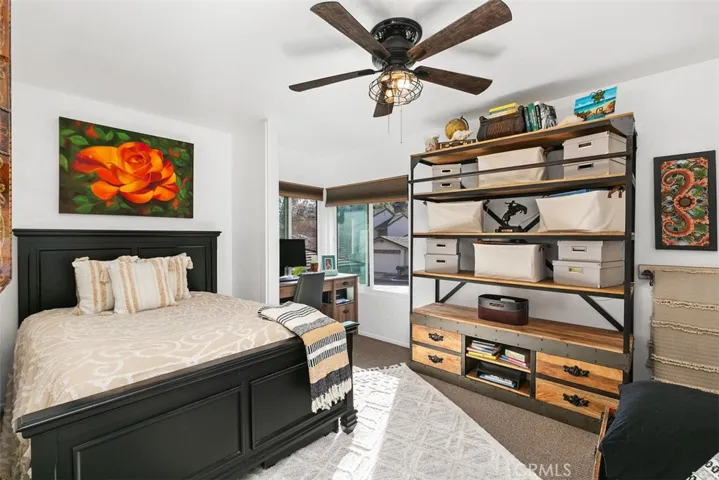 Secondary guest or childs room has great light and the perfect little corner for the desk.