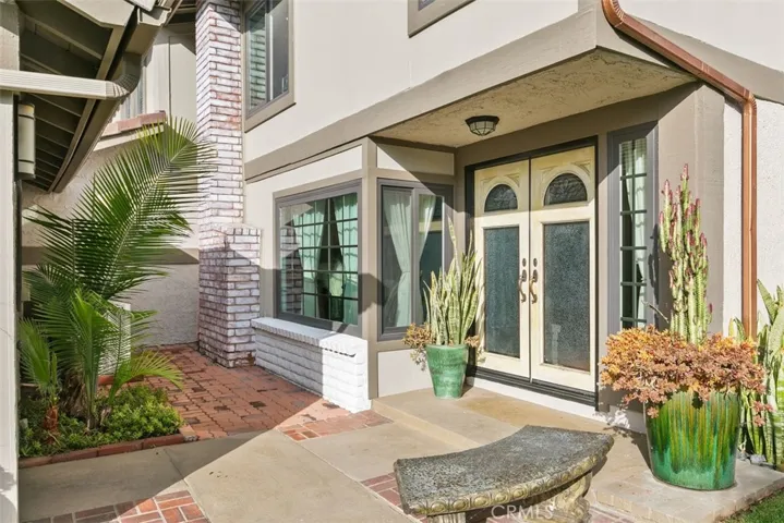 lovely double door entry and small courtyard